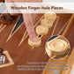 Ergonomic finger-hole wooden backgammon checkers, more comfortable than flat pieces, shown in use on light wood inlay board.