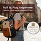 Woman with backpack carrying a rolled travel game set, ideal for on-the-go play and travel.