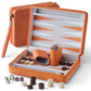 Orange PU leather travel backgammon set with felt lining and magnetic wooden pieces, ideal for portable play.