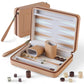 Flat lay of a tan PU leather travel backgammon set, open to reveal the felt-lined board, dice shakers, wooden checkers, and dice, with the closed zippered case in the background.