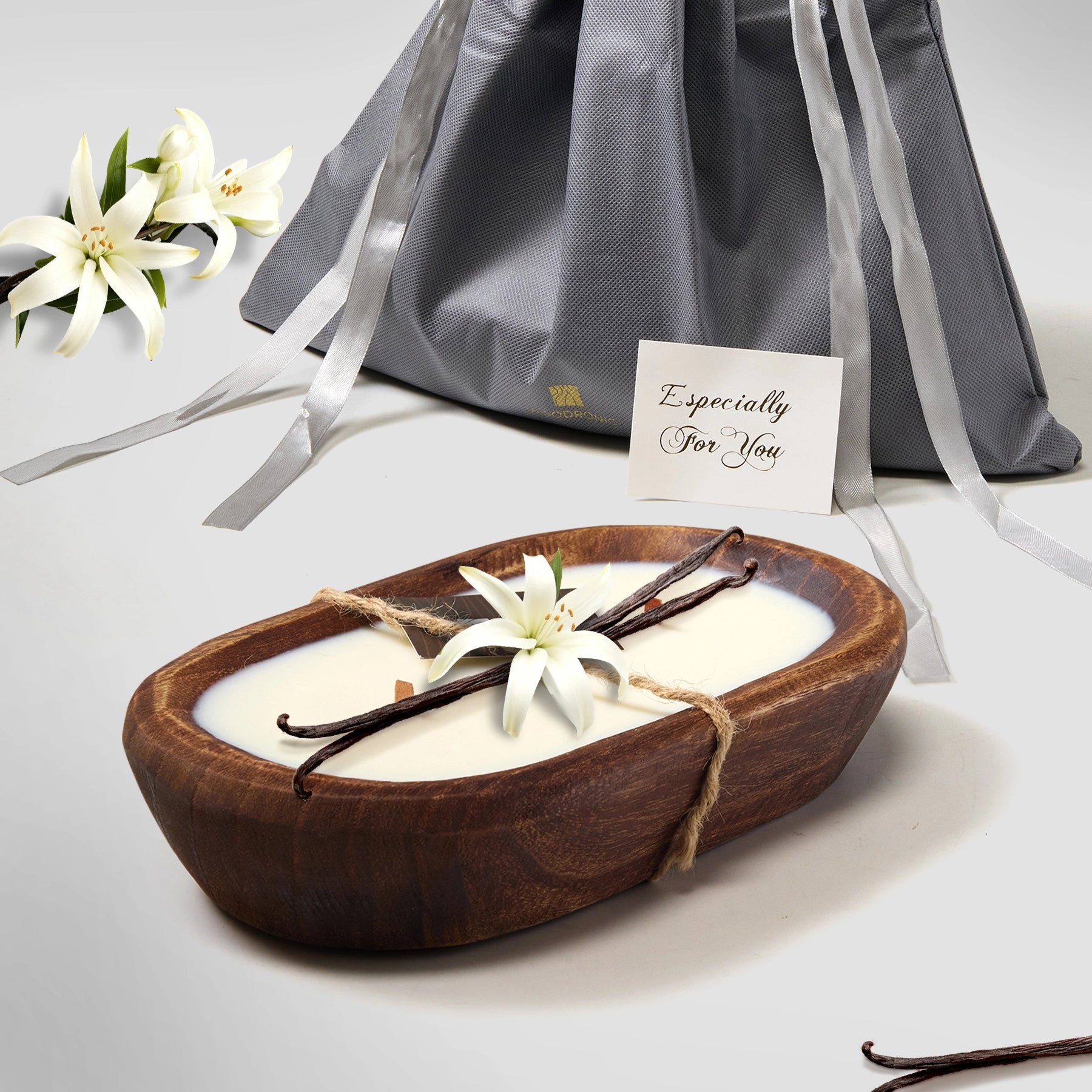 Vanilla-scented dark wood dough bowl candle, gift-ready with lily and vanilla accents, perfect for gifting.