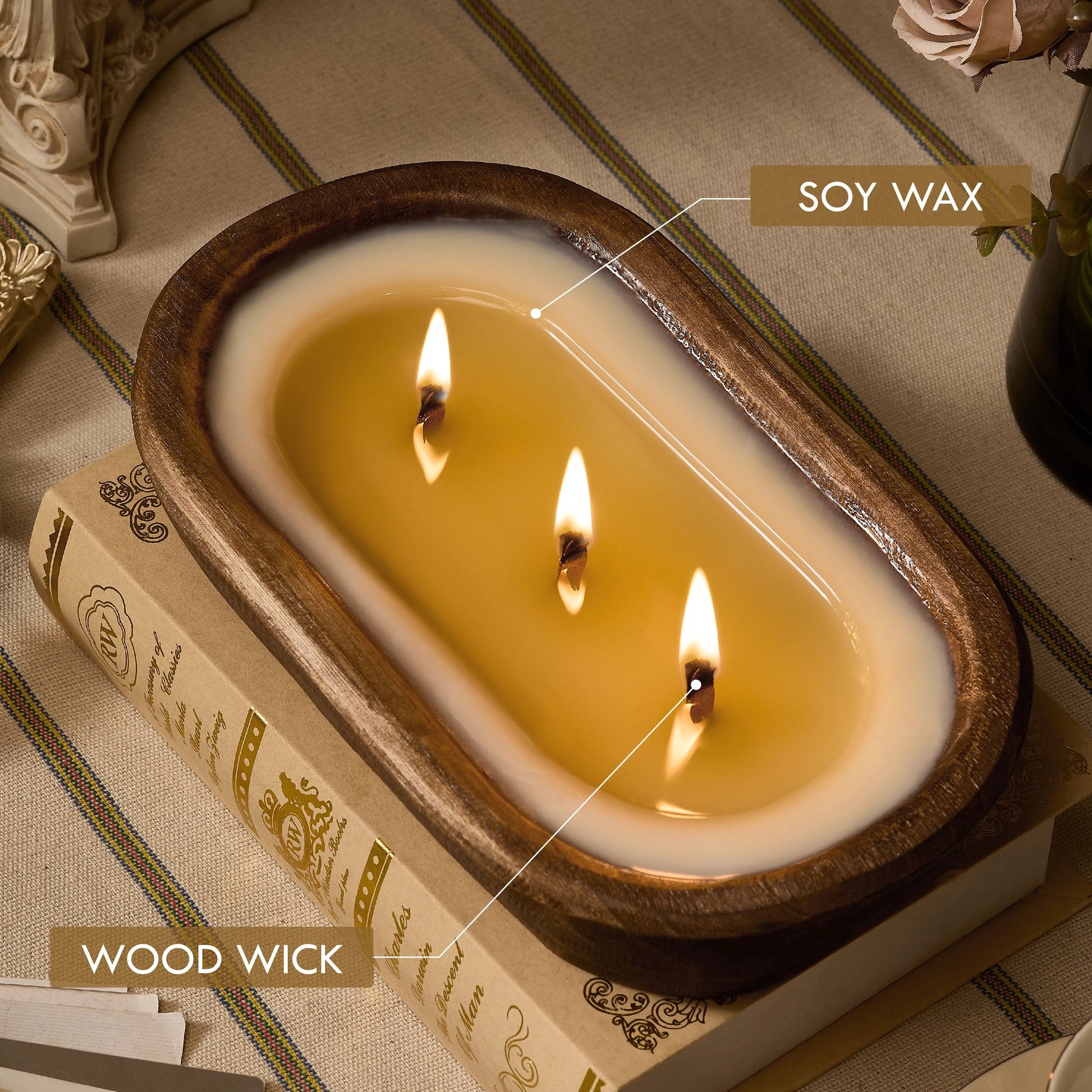 Three-wick soy wax candle in dark wood dough bowl, featuring crackling wood wicks for warm home ambiance.