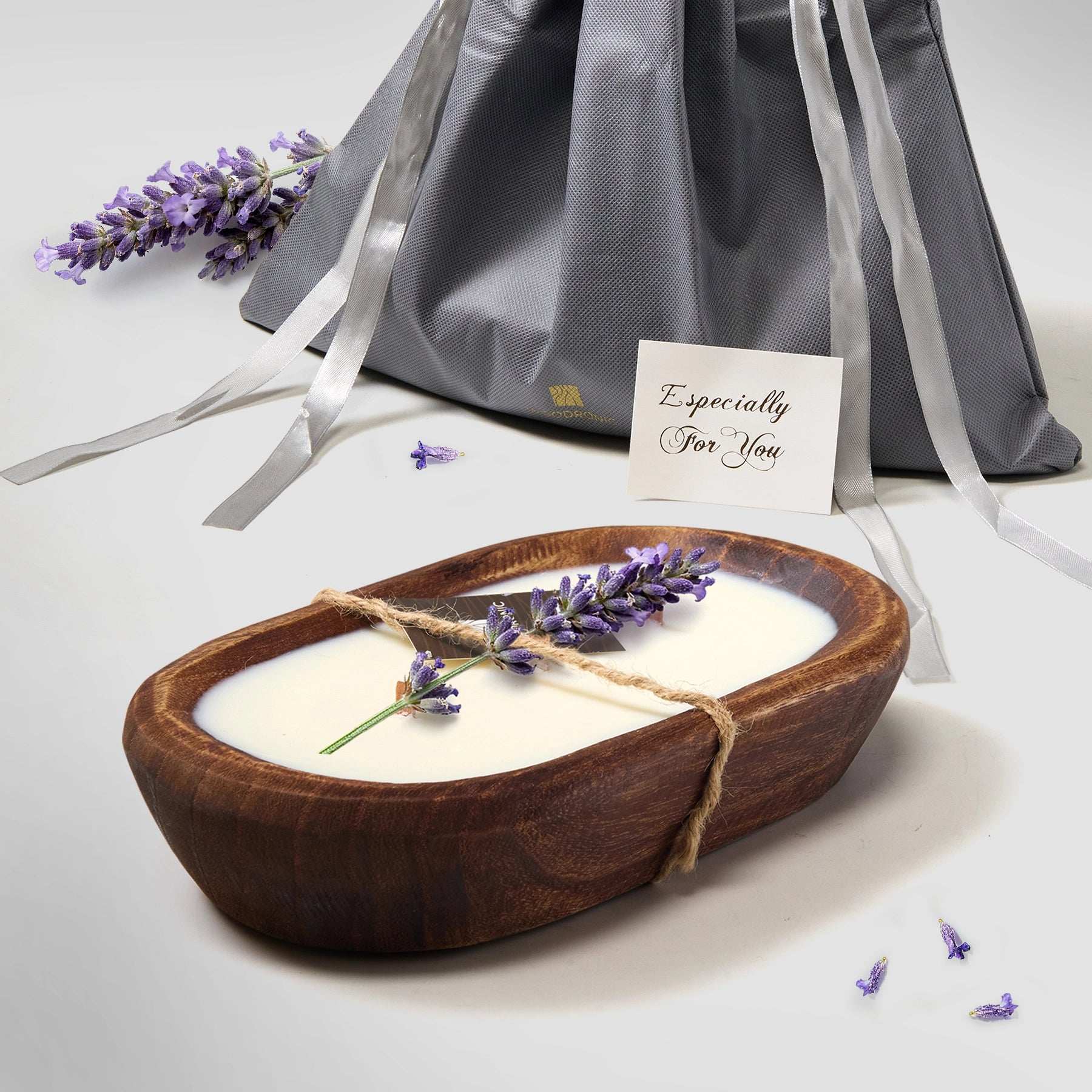 Lavender-scented dark wood dough bowl candle, gift-ready with lavender accents, perfect for calming home decor and gifting.