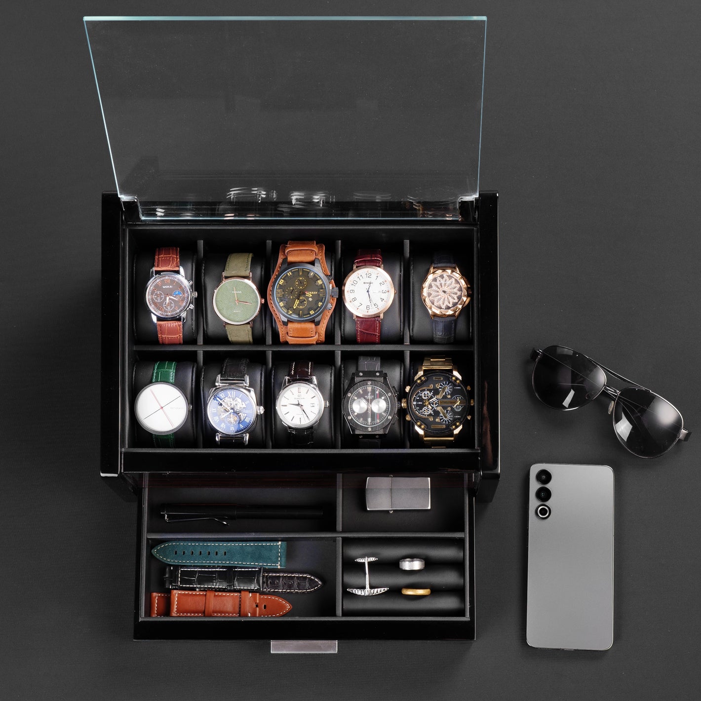 Top-down view of 10-slot watch box with glass lid, showing watch slots and divided drawer for accessories, perfect for men’s gift.